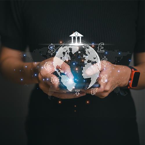 A Woman's Hands Holding a Globe Featuring Icons, Showcasing the Best Bank for Foreigners In USA