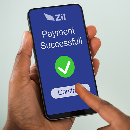 A Person's Hand Holding a Smartphone Displaying Fund Transfers, Featuring Instant Fund Transfers with Zil, the Best Varo Checking Account Alternative.