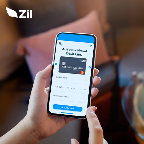 A Hand Holding a Smartphone Showing Zil Checking Account. Empower Businesses with the Enhanced Financial Control of Virtual Debit Card Free