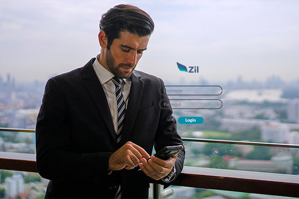 A Man In A Suite Working On a Mobilephone Opening Bluevine Alternative Accounts, Send ACH, International Wire Transfer