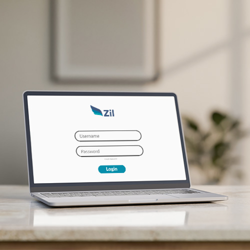 A Laptop Screen Showing the Zil Account Login Page. Checking Account Free Enhanced and Advanced Financial Payments