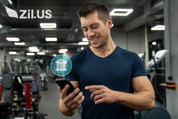 A Man Holding a Phone and Make Direct Deposit Simplify Wellness Center Payments Securely